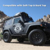 a black jeep parked on a rocky hill