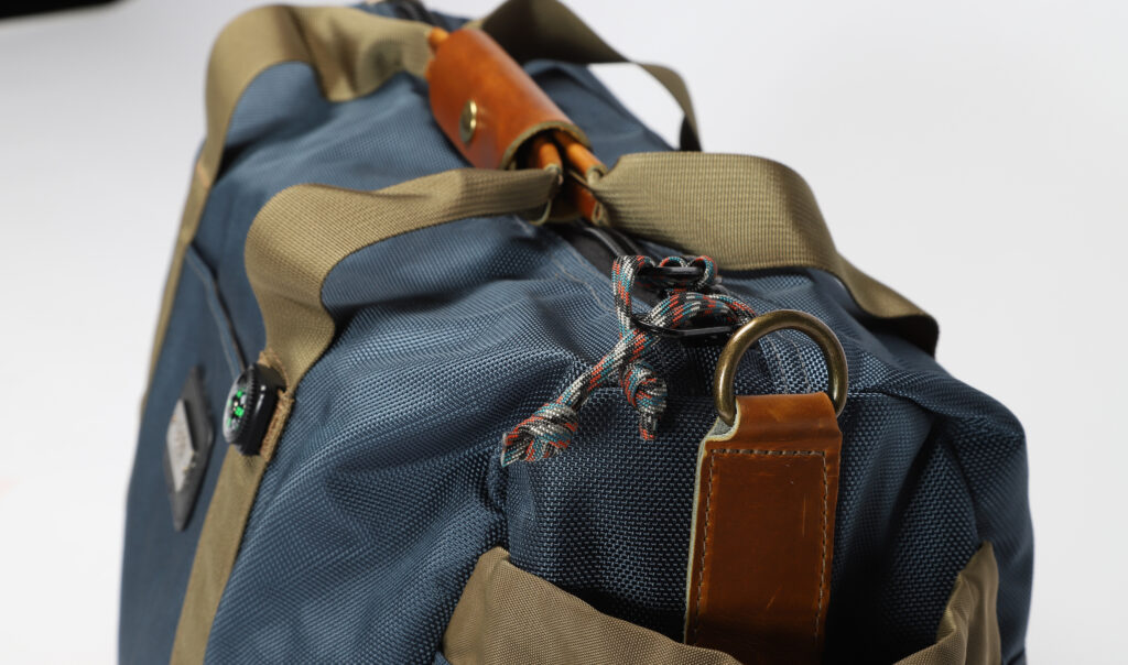 GOBI Duffel Bag Gun Metal Blue with Tan bing GOBI Racks