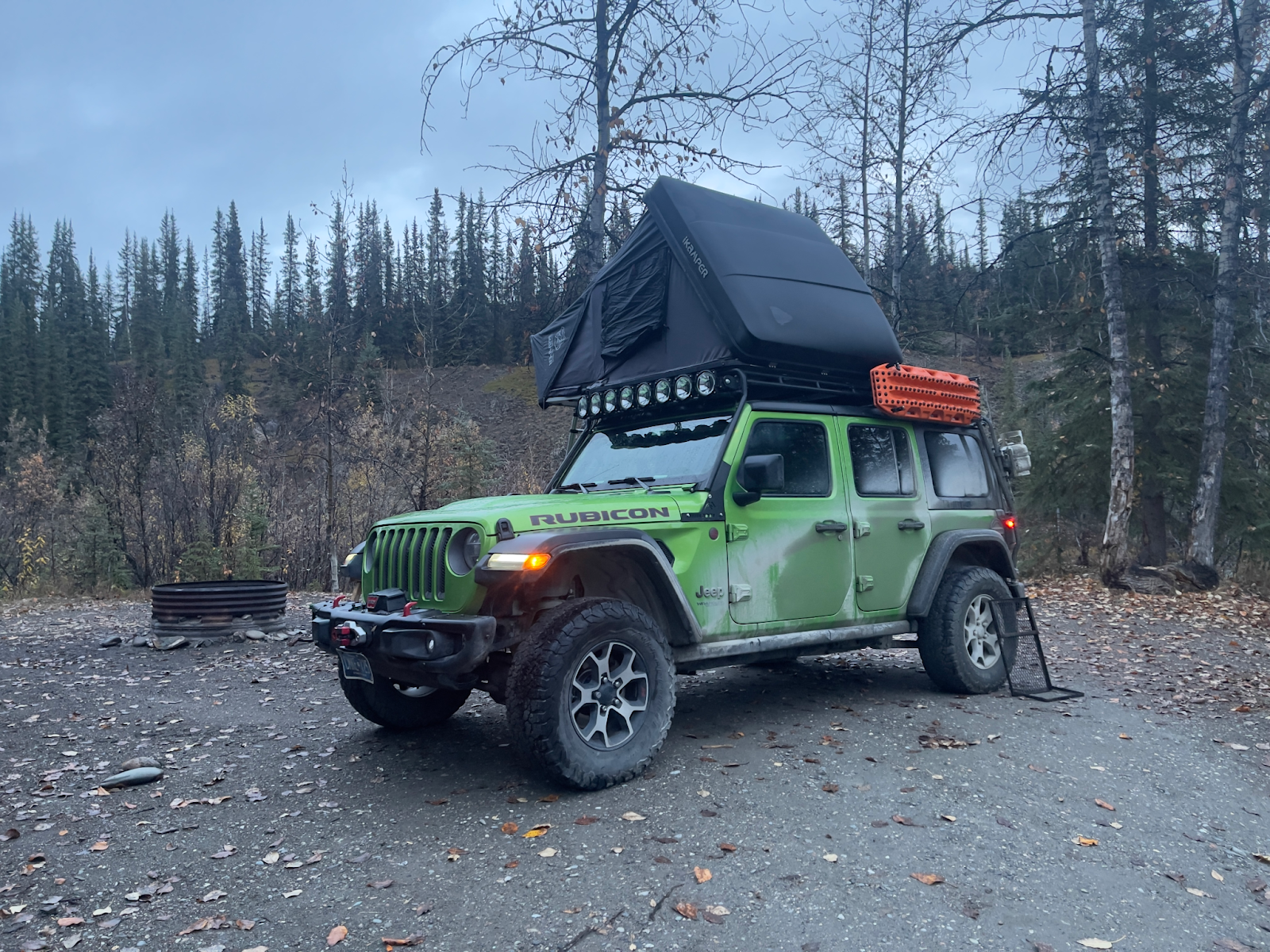 Turn Your Vehicle into a Gear Hauler: Roof Racks for Bikes, Kayaks & More | GOBI Racks A Green Jeep Wrangler with a GOBI Racks Roof Rack Holding a Tent